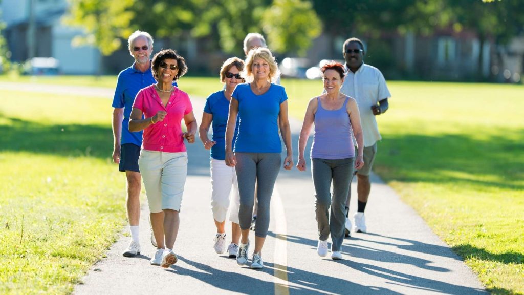 health benefits of walking daily - group of seniors walking for exercise
